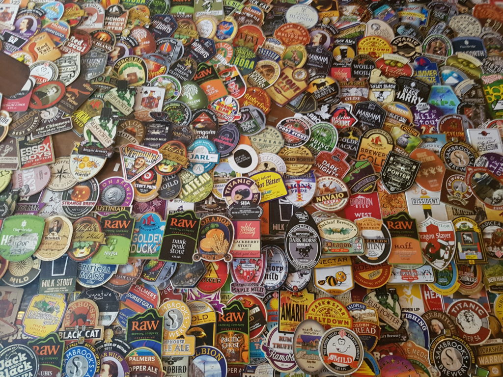 Pump clips collected over the years adorn the frontage over the bar at The Harp. 